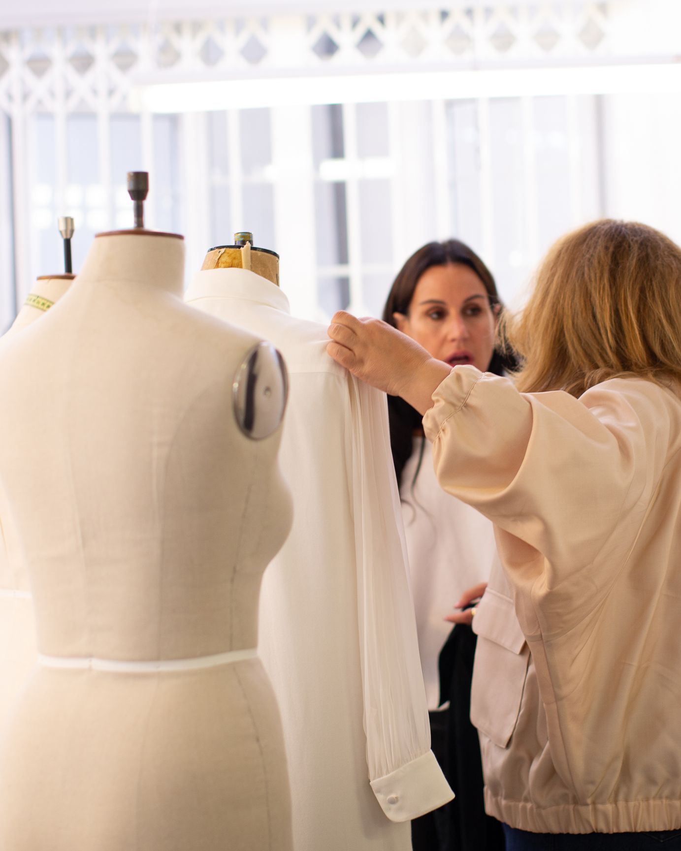 A toile on the stand during a fitting