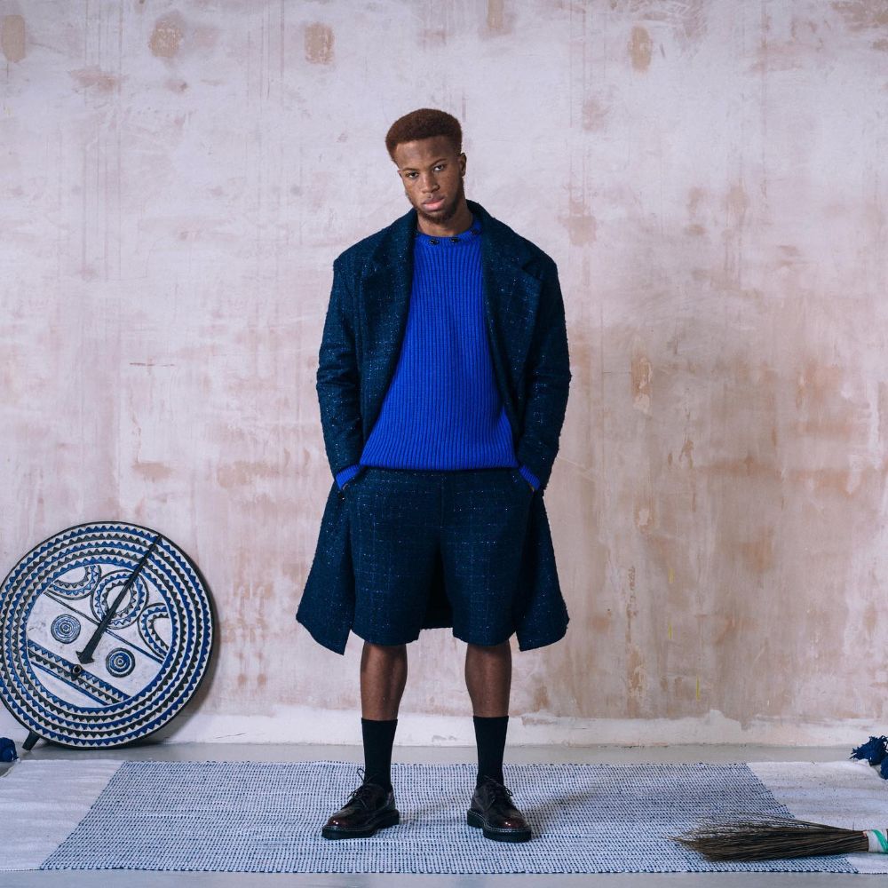 Coat and tailored shorts